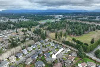 Just a short walk down the hill to the Tahoma High School campus and playfields.  You can see the the sports fields in the background.  An equal distance away is Glacier Park Elementary on the East side. Summit Park is a short distance away too.
