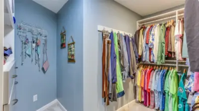 Walk-in closet was added for ample use of space in this primary suite.