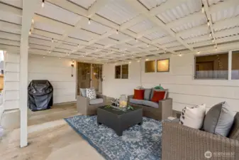 Covered outdoor space off of living room.