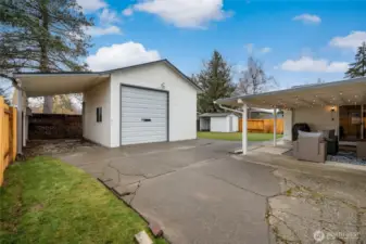 Shop with attached carport.