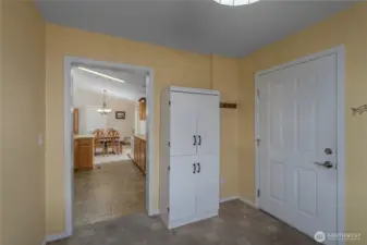 bonus room off of kitchen, leads to garage- no step entry