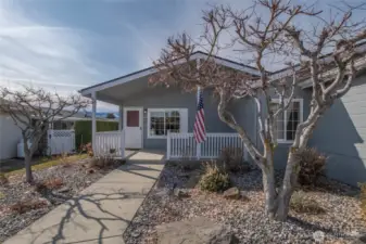 Easy care front yard landscaping- large covered front porch