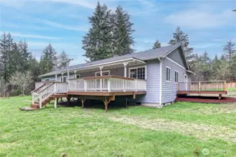 The big deck off of the great room, and private deck to the right is off the primary suite.