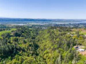 This shows behind and right side of the property drone view.
