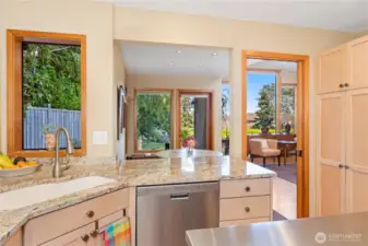 The spacious kitchen is light and bright and has granite counters and ample storage. All appliances convey, including a rather new washer & dryer.