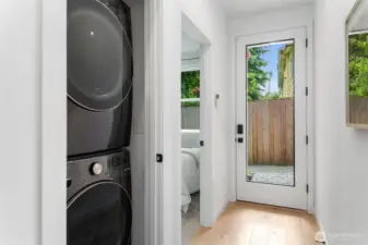 Light & bright entry with the a bedroom, full bath, and laundry on this level.