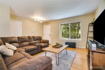 The territorial views from most rooms in this house accentuate the privacy of this spacious corner lot.