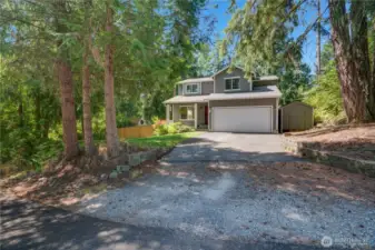 The large driveway offers ample space for parking. Plus, this home is in a cul-de-sac, so no need to worry about busy roads and traffic! Don't miss the storage shed next to the house that was re-roofed just 2 years ago!