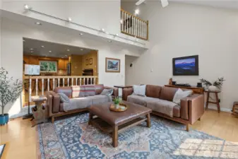 Living room features Vaulted ceilings, bamboo floors and skylights