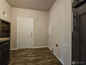Laundry Room with side door to walk way