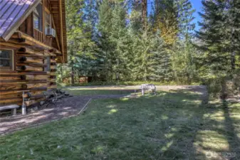 Mazama river front cabin side yard.