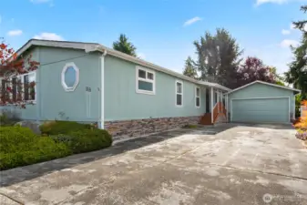 Spacious home on a large lot.  Stick built double car garage with power and automatic garage door opener, side door.