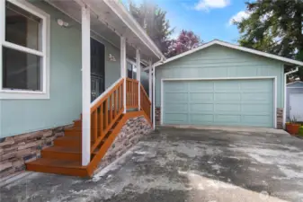This double car garage has plenty of outlets, garage door opener, and side door for access to the primary residence or its back deck.