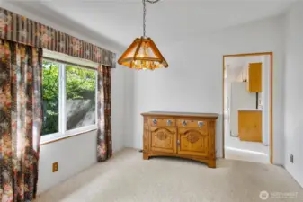 Dining room with entry to the kitchen.