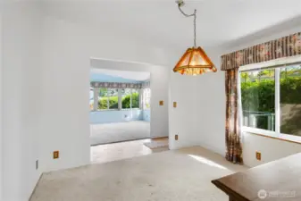 This formal dining room is between the front entry and kitchen.  The window looks out to the entry of the home.