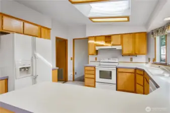 Fridge, range and dishwasher included.