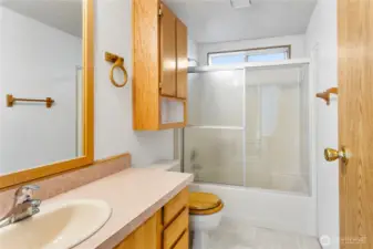 The main bath is located between bedroom #2 and badroom #3.