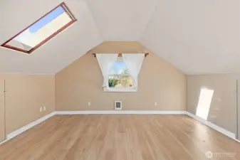 Massive upstairs bedroom with new LVP flooring (2025)