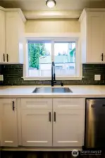 UNDERMOUNT SINK..AND A NICE VIEW OF THE DECK WHEN YOU GET STUCK DOING THE DISHES