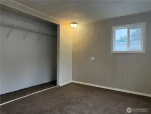 This closet runs almost the whole length of the wall.