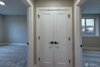 Hall closet between bedroom #2-3