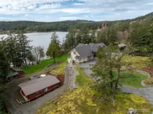 Main home with guest home #1 in the foreground and guest home #2 closest to the waterfront.