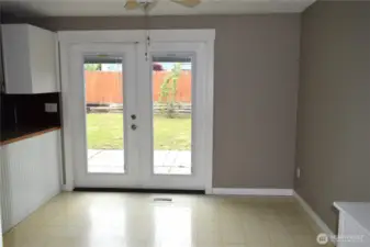 French doors to large fenced back yard