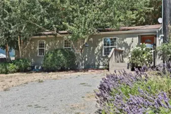 Welcome to this cute Freeland home. The trees in front offer privacy and shade while also adding some character.