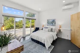 This lower-level bedroom is spacious and bright.
