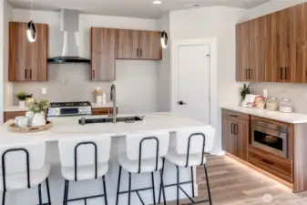 Gas cooking range and toe kick lighting