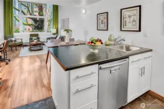 Wall of windows bathes the unit in light