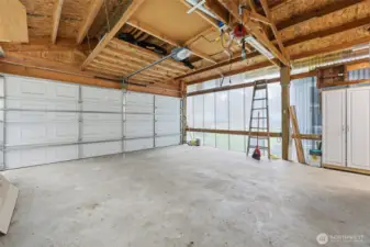 2 car garage with opener, natural light, power and room!!!