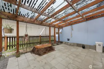 View from back porch with garage on right.