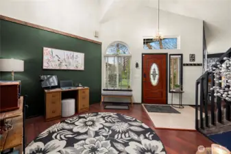 On the other side of the stairs is this entry/office/library/playroom