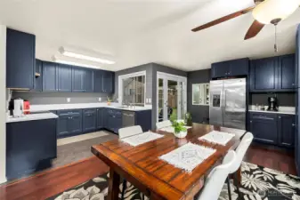 This open dining room and kitchen area is so inviting