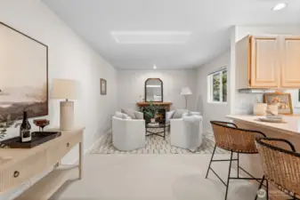 Additional entertainment or gathering space enhances the hosting experience.