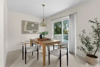 Tranquil dining space with large sliding glass doors offers beautiful backyard scenery to enjoy.