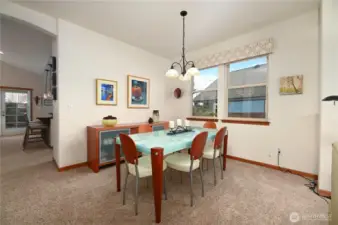 Dining room off the living room. Great open floor plan that is great for living and entertaining.