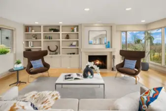 Here we see the window that looks out upon the private entry courtyard.  The fireplace is wood-burning, but is plumbed for gas for easy conversion.  On a clear day you can see Mt. Baker through that corner window.