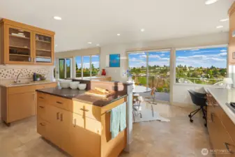 Oh that's right, there's a wet bar too!!  Seriously, how much fun would you have living here?  It's hard to take life too seriously when the energy resonating from your home is so inviting and happy.