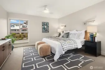The primary suite easily accommodates a king bed plus sizeable nightstands and a big dresser.  You may or may not need that ceiling fan, as this home is outfitted with Central A/C to keep things nice and cool on hotter days.