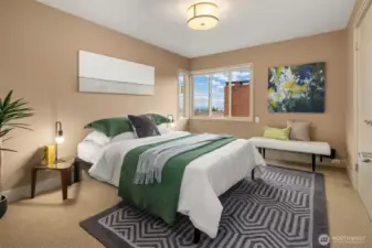 Second bedroom upstairs in addition to the primary suite - that's a total of three if you're counting :)    This one enjoys views toward Downtown.