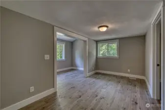 There are two bonus rooms off bedroom #3. This north wing of the home would be ideal for multi-generational living. This room would be a great living room and the area to the left an office or maybe a craft room.