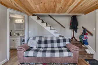 The living area and bathroom to the left, very cozy.