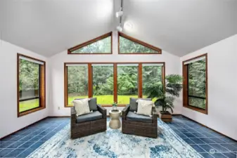 Sunroom off primary bedroom.