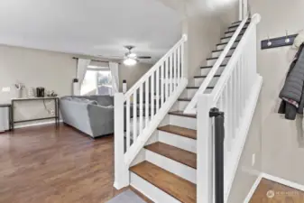 Head upstairs to the three bedrooms and two full baths.