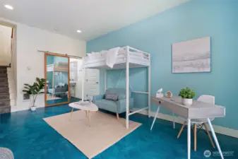 Spacious Main Floor Flex Space for sleeping, games, TV, office etc.