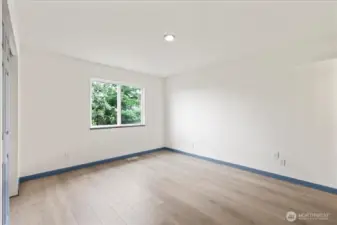 Primary bedroom, large enough for a King bed.