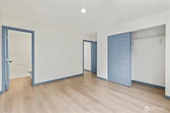Primary Bedroom; en-suite bath is to the left, hallway is in the middle, closet is on the right.