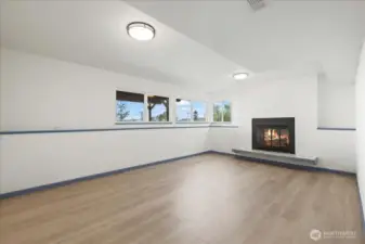 Family room, enough room for just about anything you'd want in here. Fitness room, dual offices, playroom, TV room, library....dream on my friend! The view from here is also unbeatable. Also has a wood burning fireplace.